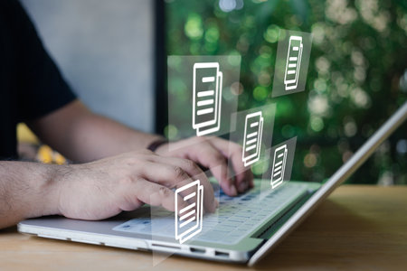 Businessman using a computer to document management concept, online documentation database and...