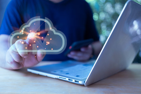 Businessman touching connect to virtual cloud computing in hand concept. Cloud computing is a system...