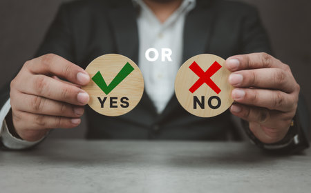 Wooden blocks show checks marks and are wrong and yes or no word on it. concepts decisions, votes, and thinking yes or no. Business options for difficult situations true and false symbolsの写真素材