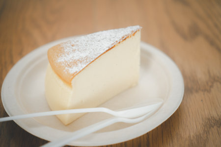 Sponge cake baked on paper dish at homeの写真素材