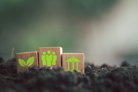 Icons of environmental, social and governance on a wood block on soil and blur background. The idea for sustainable modernization development.の写真素材