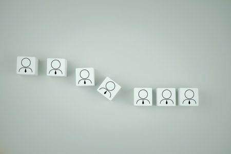 Arranging wooden block with person icons. Human resource management and recruitment people...