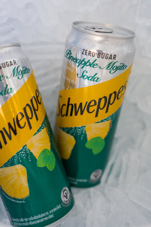 Bangkok, Thailand - August 6, 2023 : Can of Schweppes Pineapple Mojito Soda Zero Sugar contains the flavors of pineapple, mint, and limeのeditorial素材