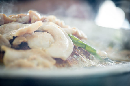 Pork or meat on the hot pan. Pork pan it is a Thai style barbecue, pork pan, buffet in the soup.