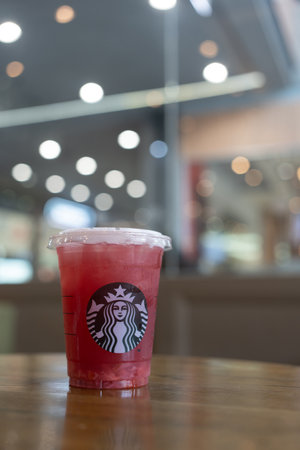 Bangkok, Thailand - August 31, 2023 : Thailand Exclusive drink, a glass of iced Shaken Lychee Rose with Hibiscus Lemon Teaのeditorial素材