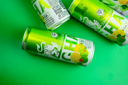 Samut Prakan, Thailand - August 31, 2023 : The new products from  Singha. Singha Ume Lemon Soda comes in a sparkling green 330 ml Zero Sugar on a green background. The brand is SINGHA in Thailandのeditorial素材