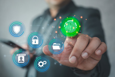 Businessmen use fingerprint scanning to access the system and digital processing identification to...