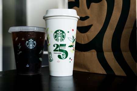 Bangkok, Thailand - October 16, 2023 : 25th Anniversary, Starbucks Thailand, get 1 free when purchasing any type of beverage, size 12 ounces or more. Limited-editionのeditorial素材
