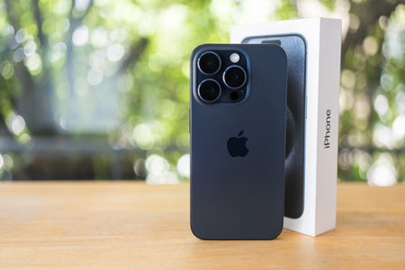 Bangkok, Thailand - October 16, 2023 : Apple launch new smartphone iPhone 15 Series, Blue titanium colour, 48 megapixel main camera and triple-lens camera setup with 5x optical zoomのeditorial素材