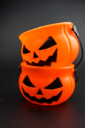 Pumpkin basket for kid collecting candy, trick or treat on Halloween day celebrationの写真素材