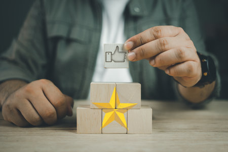 The businessman put sign of the top service Quality assurance, Guarantee, Standards, ISO certification, and standardization concept. Quality control standardsの写真素材