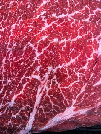 Raw beef background and beef texture. Texture or background of tasty fresh meatの写真素材