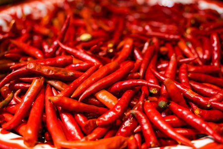Stack of red hot chili peppers. Close upの写真素材