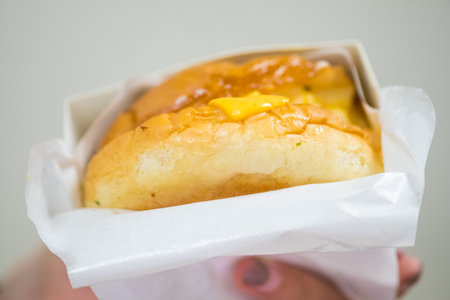 This Korean egg drop sandwich or scrambled egg sandwich is made with soft, fluffy eggs, buttered toast, is the perfect brunch or breakfast egg sandwich, satisfying, and keeps you full for hours.の写真素材