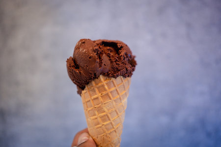 Close up image of chocolate ice cream coneの写真素材