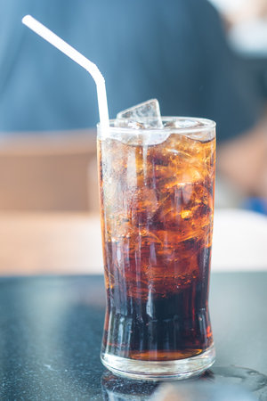Refreshing soft drink with ice on the table. Close upの写真素材