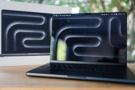 Bangkok, Thailand - December 7, 2023 : New Apple MacBook Pro M3 Max, space black colour, 14 Inch screen. Max high tech laptop and modern designのeditorial素材