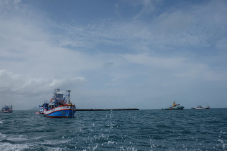 Thai fishing boat sailing sea and sky background. Blur backgroundの写真素材