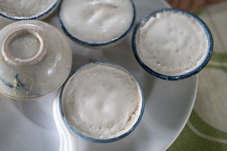 Thai call Kanom Tuay or Steamed Coconut Milk traditional Thai dessertsの写真素材