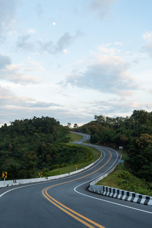 Third Road, Nan Province, Thailand, look like number 3. An iconic tourist attraction place on the way to Bo Kluea district, Nan, Thailand.の写真素材