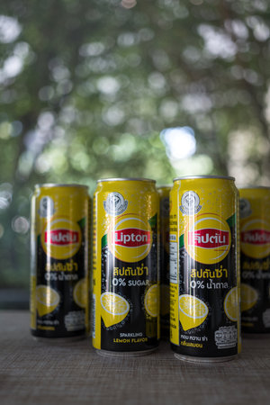 Bangkok, Thailand - December 12, 2023 : Cans of Lipton ice tea sparkling lemon flavour with no sugar, 325 ml.のeditorial素材