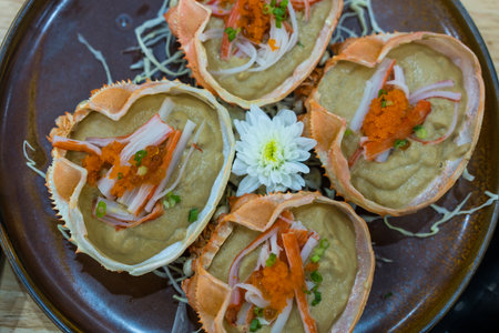 Crab meat with soybean paste grilled in crab shell. Japanese traditional food. Close upの写真素材