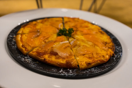 Pizza with smoked salmon. Close up. Whole pizza with salmon.の写真素材