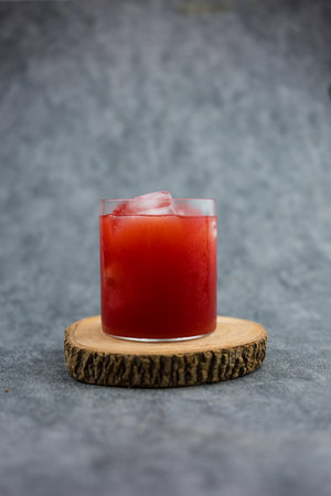 Cold pressed pure watermelon by slow juicer in a glass with ice. Close upの写真素材