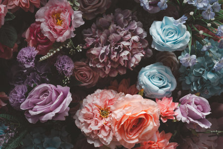 Artificial flowers background. Decoration artificial flower fabric bouquet backdrop backgroundの写真素材