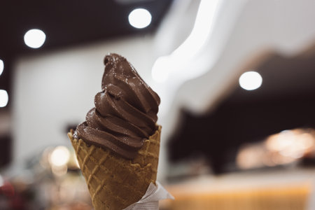 Chocolate soft ice cream waffled cone. Close upの写真素材