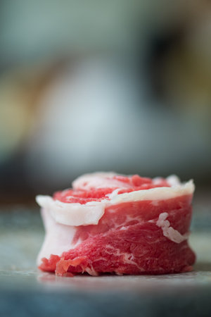 Premium Rare Slices beef with a high marbled texture make shape of a rose on a plate served for Sukiyaki and Shabu.の写真素材