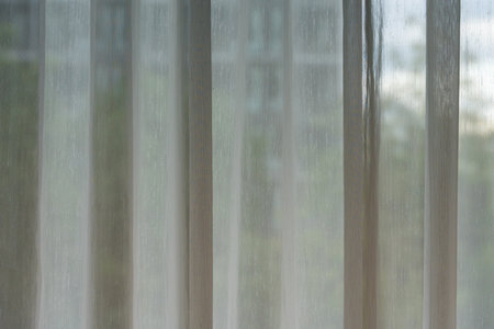 White transparent curtains in the empty room, decorative curtain on windowの写真素材