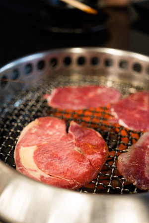 Raw beef slice for barbecue or Japanese style yakiniku food.の写真素材