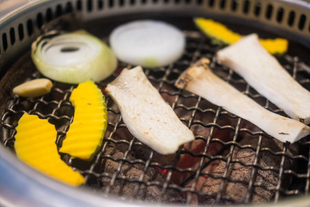 Assorted of sliced raw vegetable in hot grill. Close upの写真素材