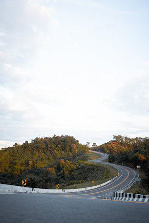 View of beautiful curved road look like number 3 on the high mountain along the way to Bo Kluea district in Nan province, Thailand.の写真素材