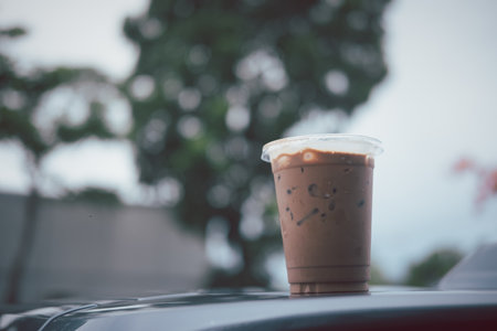 Iced mocha coffee. Espresso coffee mixed chocolate in a plastic take away cup in the morning.の写真素材