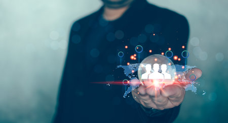 Businessman in suit holding glass with a network structure world map and business digital network technology, Global structure customer network technology. Human icons hologram digital networkの写真素材