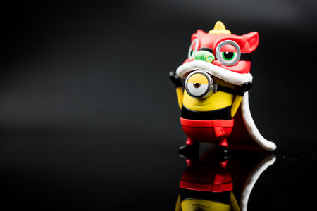 Bangkok, Thailand - January 9, 2024 : Cute a collectible POP MART with Series Minions Travelogues of China. Lion Dance Stuart. Figures Blind Box from POP MARTのeditorial素材
