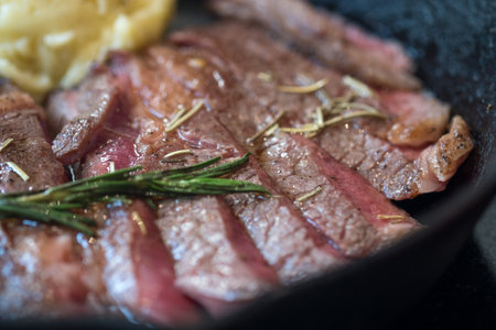 Grilled sliced beef steak serving platter, recipe idea  medium rareの写真素材