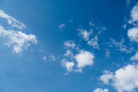 Blue sky background with clouds. Empty skyの写真素材