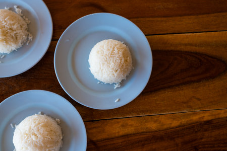 Thai Jasmine rice on plate in restaurant. Rice is staple food of Thailand and Asia, providing energy in every meal.の写真素材