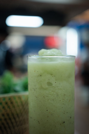 Fresh green kiwi smoothie. Healthy organic drinkの写真素材