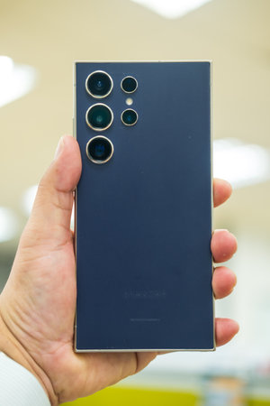 Samut Prakan, Thailand - January 31, 2024 : Human holding a new Samsung launch The New Samsung Galaxy S24 Ultra new models. Modern mobile phone technology concept with AIのeditorial素材