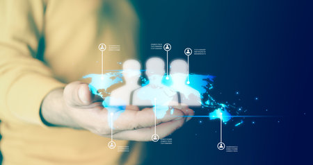 Customer relationship management in digital global online network and marketing strategy. Man hold of human and global structure CRM, planning marketing global structure customer network technology.の写真素材