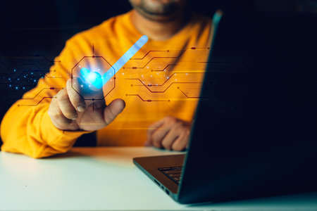 Man touching check icon on virtual screen to confirm. Business process automation, certification, service guarantee, Validation concept. Concepts for e-signaturesの写真素材