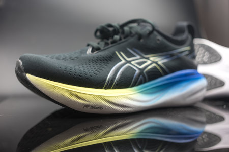 Bangkok, Thailand - February 5, 2024 : Running shoes from the brand Asics. ASICS is a Japanese athletic equipment company that produces cushioning footwear.のeditorial素材