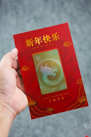 Bangkok, Thailand - February 3, 2024 : BTS Rabbit card for use the BTS sky train at Bangkok. New collection, year of dragon, Happy Chinese new year 2024, is two colours red and goldのeditorial素材