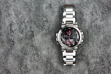 Samut Prakan, Thailand - February 8, 2024 : G-Shock is tough watch and luxury for gentlemen who use this watch during daily routine. G-Shock model MTG-B1000D-1ADR design stainless steel.のeditorial素材