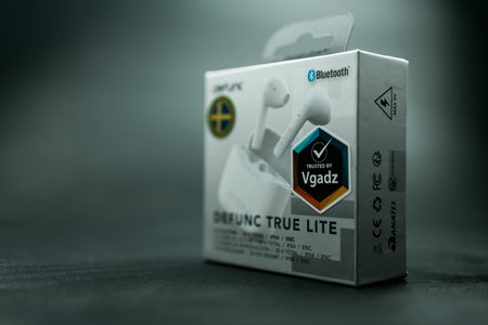 Bangkok, Thailand - February 8, 2024 : A box of earphones Defunc wireless headphones TRUE BASIC model with case for charging. The newest wireless earbudsのeditorial素材