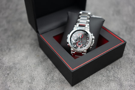 Bangkok, Thailand - February 14, 2024 : Casio G-Shock model MTG-B1000D-1ADR is displayed on the black packaging, luxury fashion watchのeditorial素材